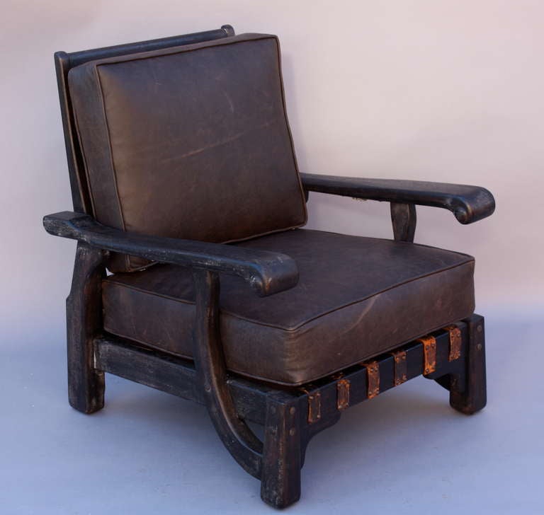 Circa 1930's armchair made by Barker Bros. As pictured with cushions. Chair was recently refinished and upholstered.