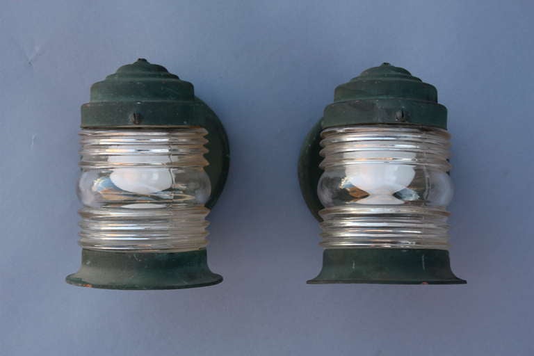 Priced for pair. Circa 1930's brass sconces with original green patina.