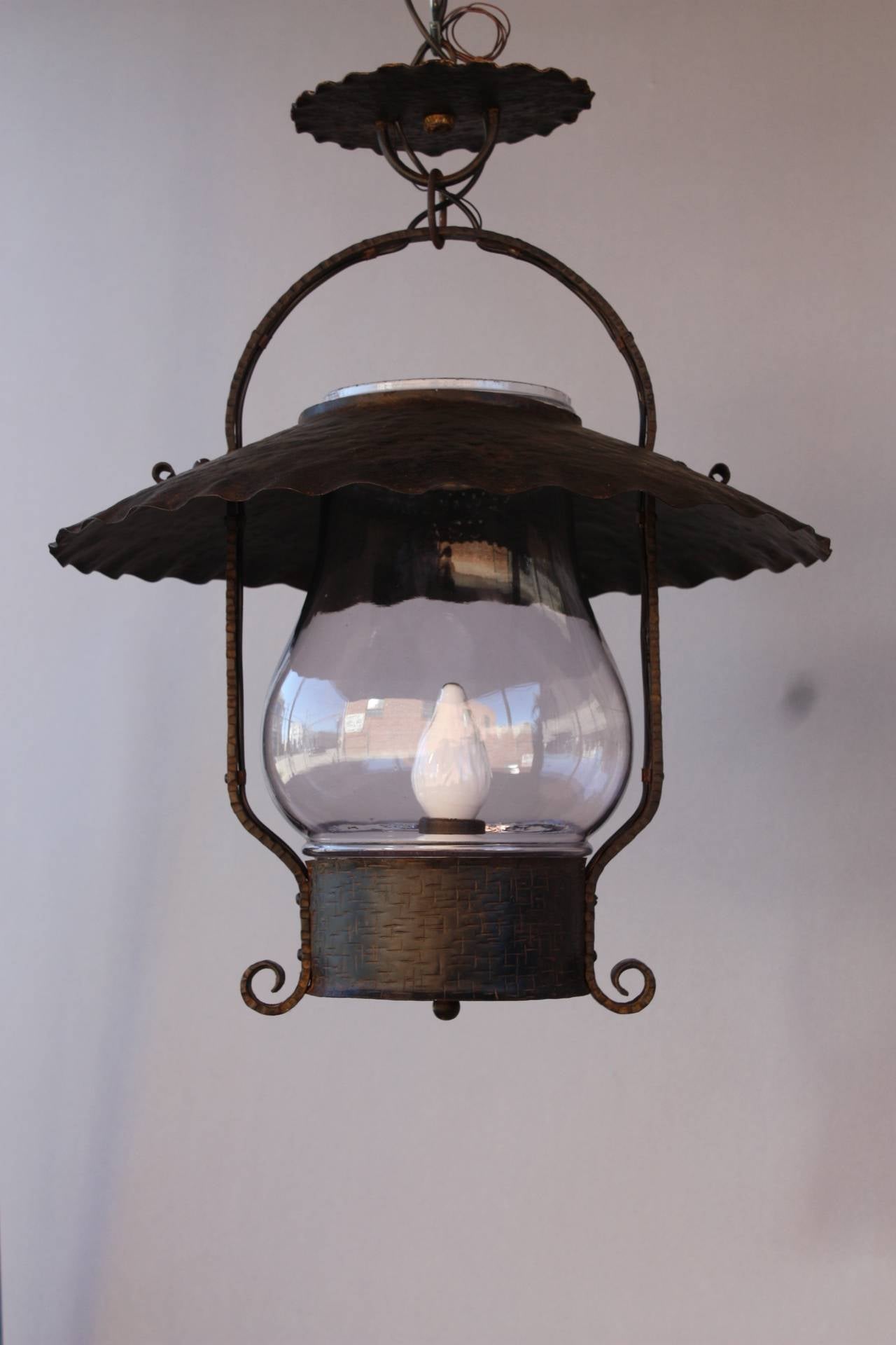 Priced individually. Mission style lantern with hammered texture and glass hurricane. 21