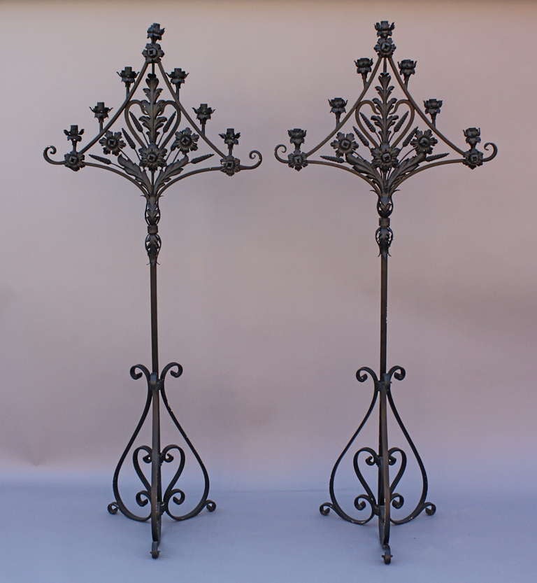 Circa 1930's wrought iron torchieres. Not electrified.