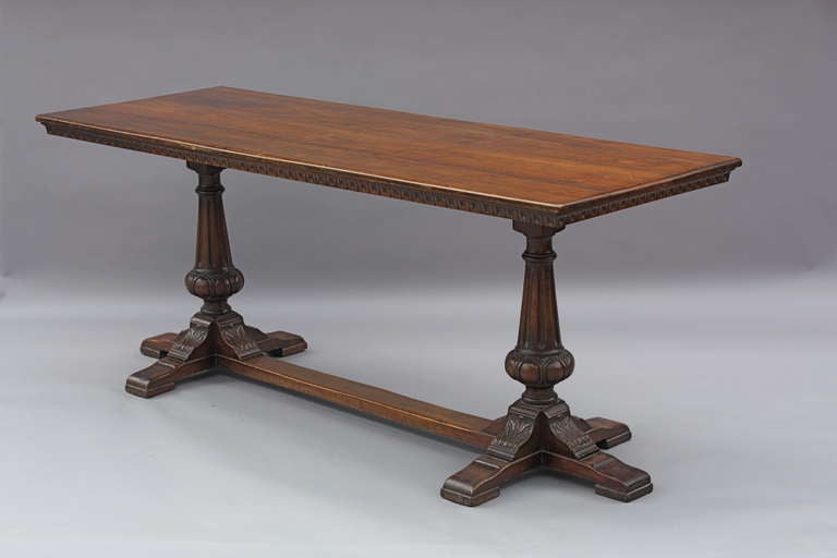 Circa 1920's walnut console table. Beautiful rich original finish with carved acanthus leaf motif.