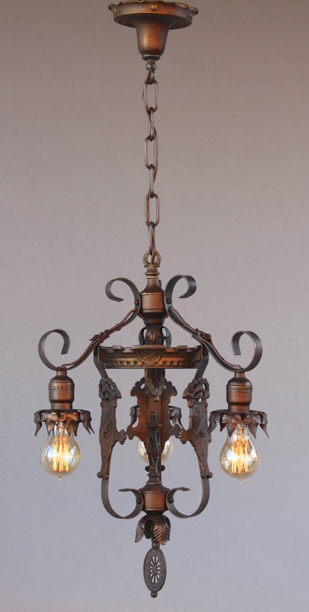 Nicely styled 1920s chandelier with three downlights and original polychrome finish. Measures 13 3/4