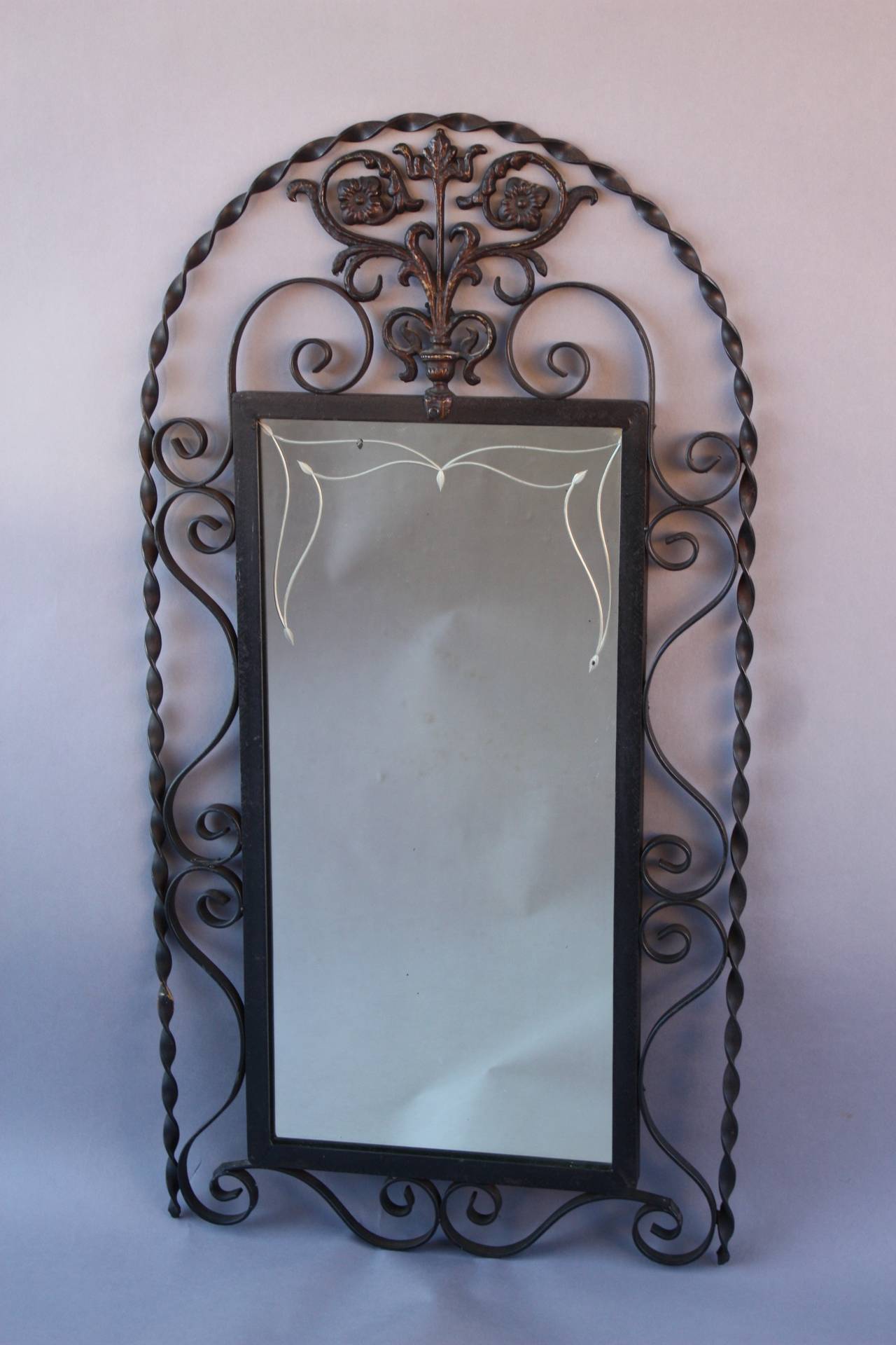 Mirror with original etched glass and original polychrome finish, circa 1920s. Mirror retains its original Pacific Glass label from East LA. Measures: 34 7/8