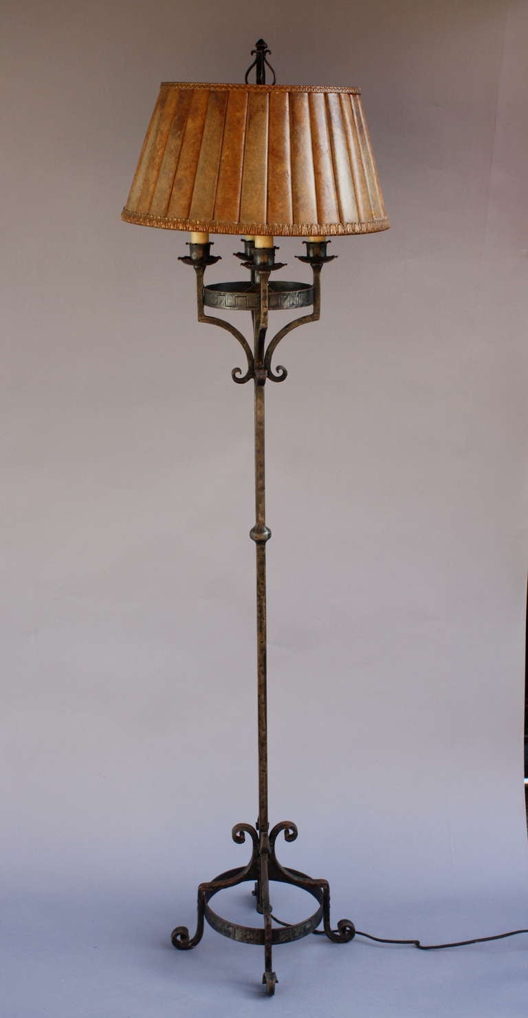 Circa 1920's floor lamp with great hammered iron base and fantastic original mica shade. 74
