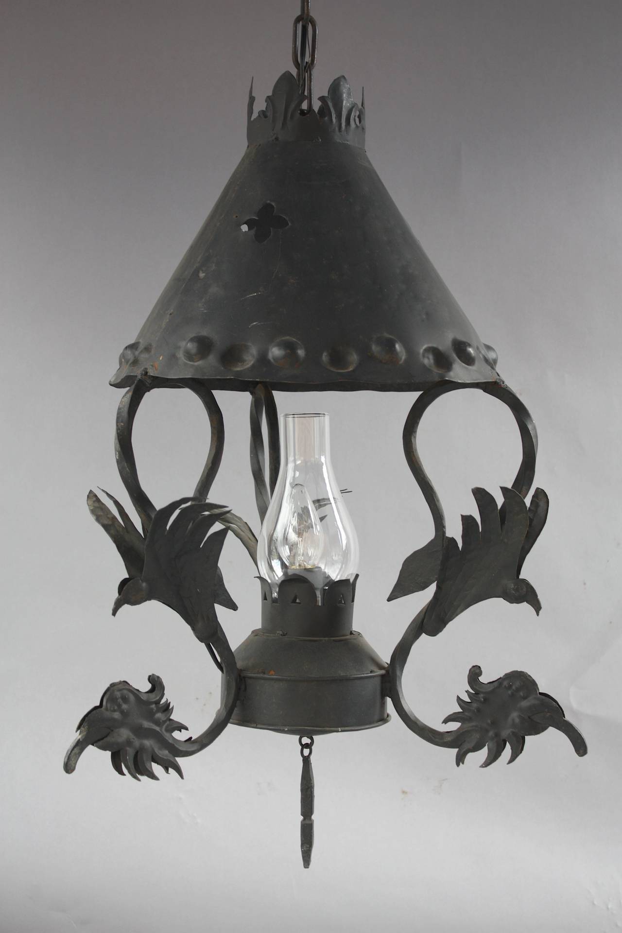 Wrought iron fixture with magnificent iron work, circa 1920s. The body of the fixture is 30.5