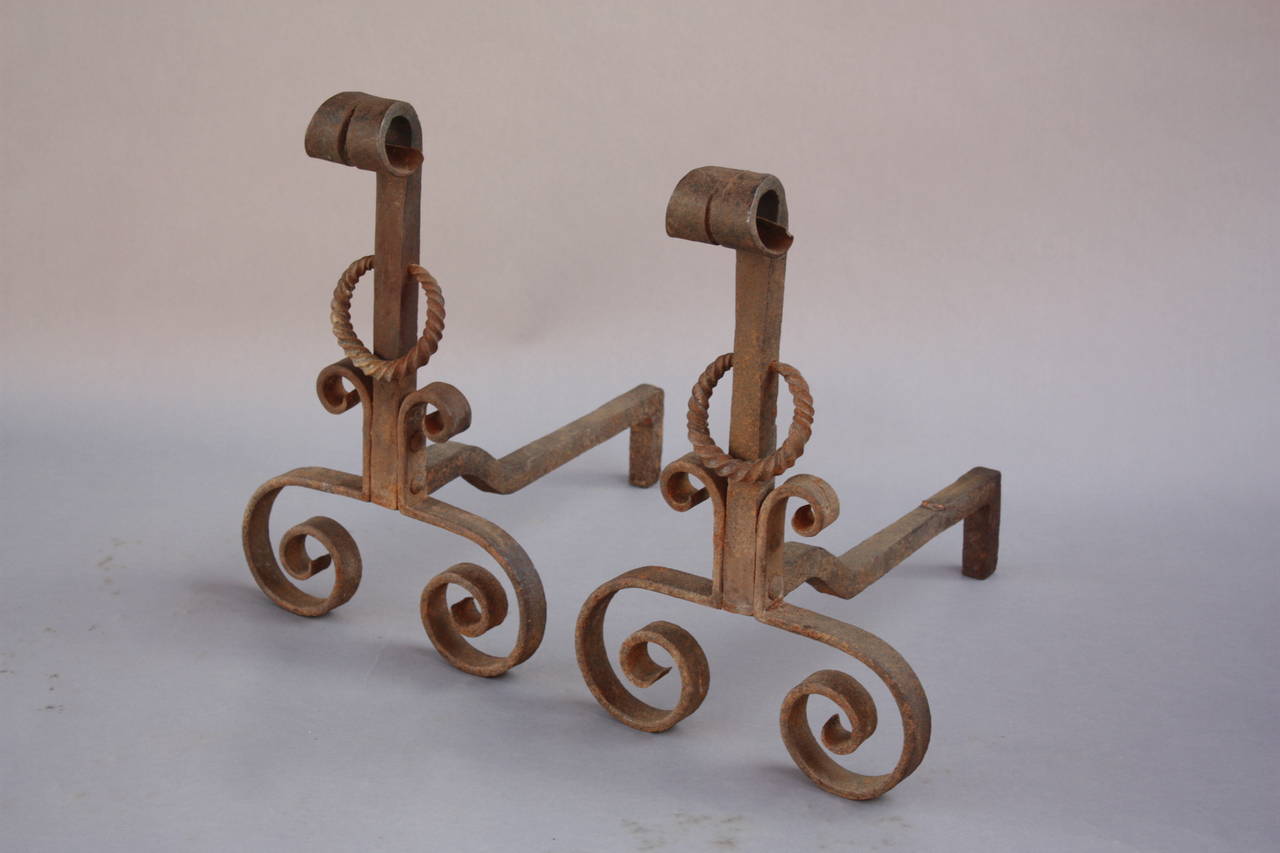 Circa 1920's andirons with classic Spanish Revival lines. 18 5/8