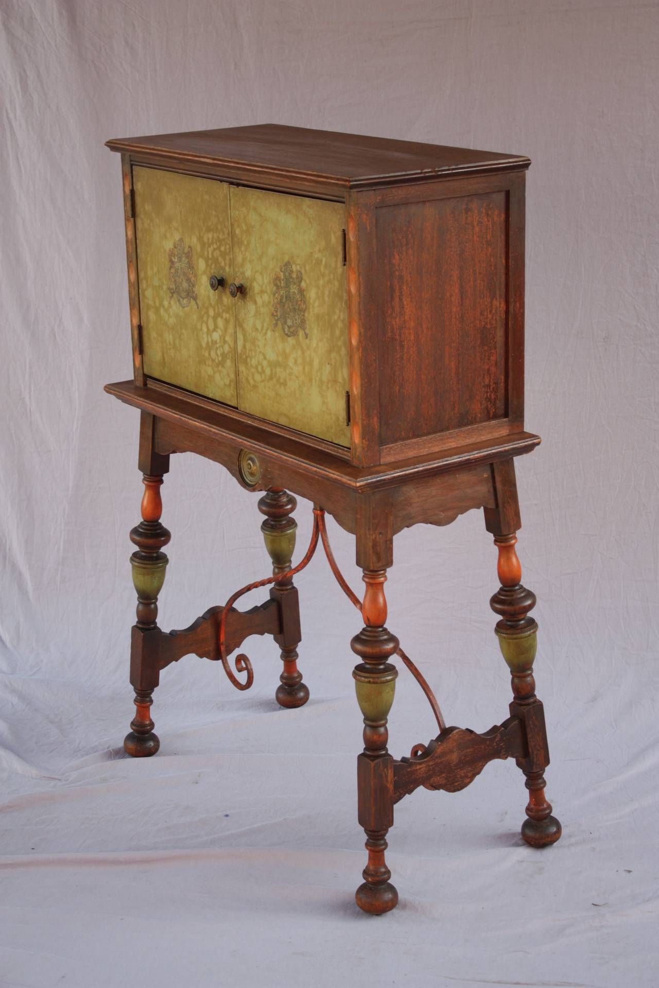 Circa 1920's small vargueno type desk cabinet. Original finish and iron work. Measures: 32.5