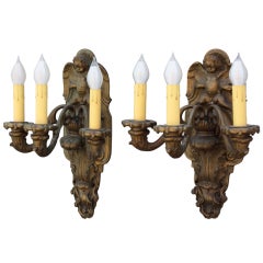 Antique Pair of Bronze Sconces with Winged Cherubs and Acanthus Motif