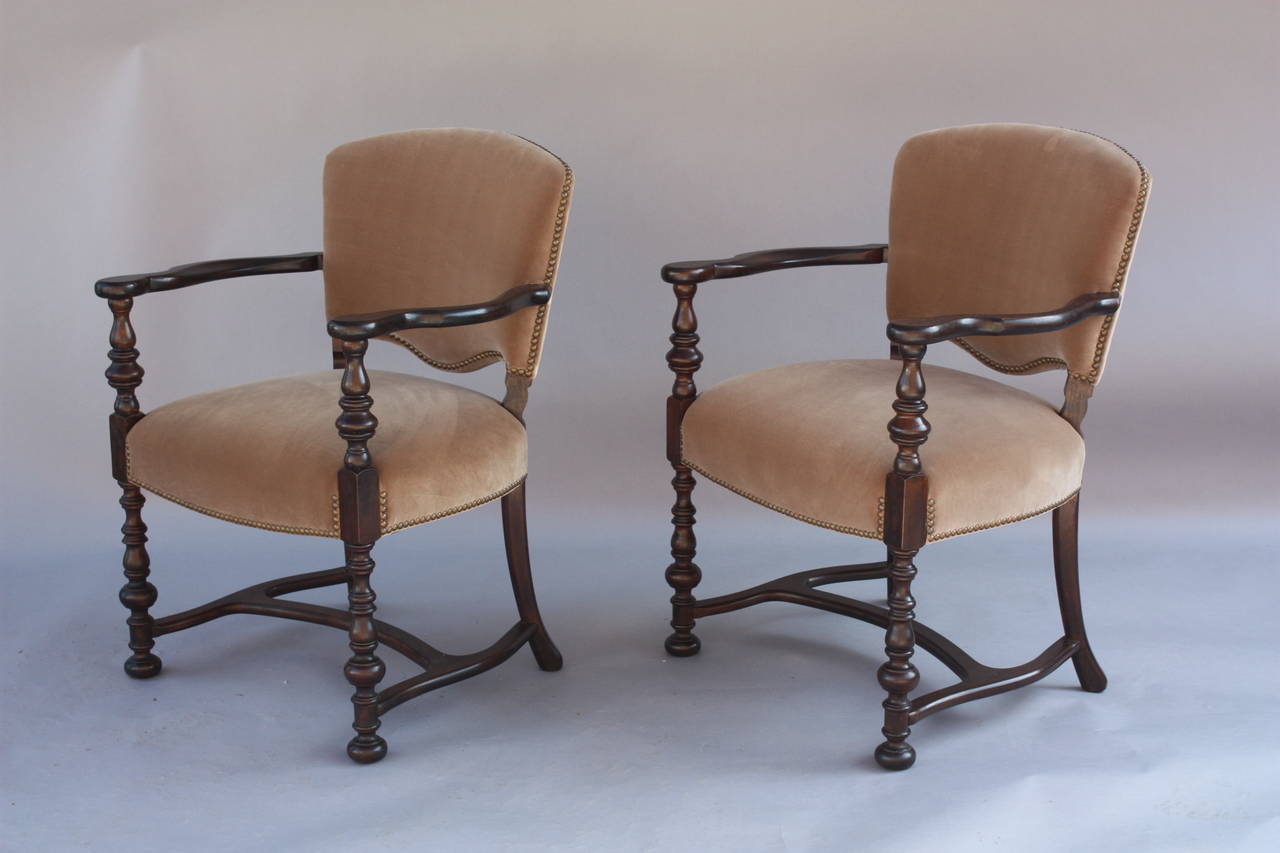 Carved walnut armchairs with new Belgian velvet upholstery. Each measures:27