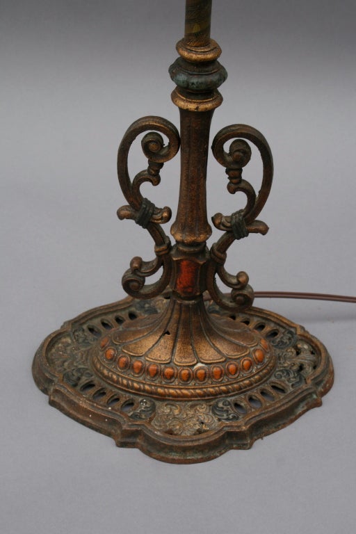 Polychrome standing lamp with beautiful detailing and elaborate 1920's mica shade.