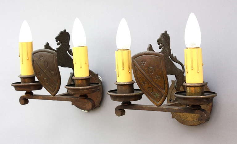 Pair Of Lion and Shield Motif Hand Forged Sconces