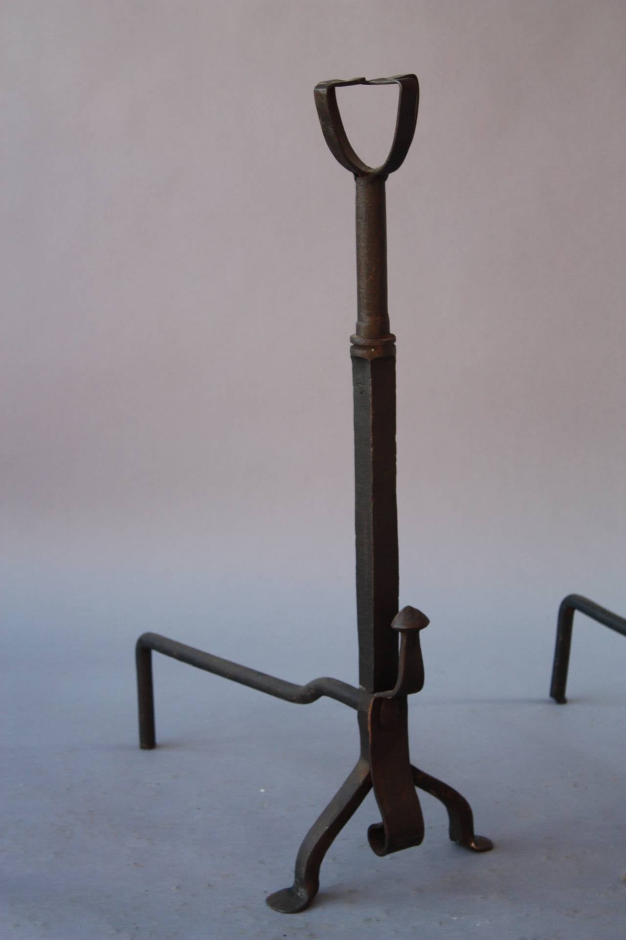 Very simple pair of andirons. Wrought iron construction. Circa 1920's. 30 1/8