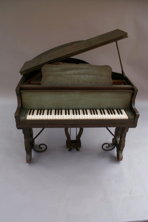 Adorable all original Monterey piano with bench. Signed and branded. Circa 1930's. Beautiful Old Wood Finish in combination with a blue finish. Original painted flowers. This wonderful signed Monterey baby grand piano was originally crafted for a