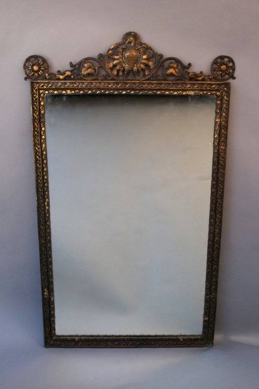 Very finely casted mirror with peacock motif.