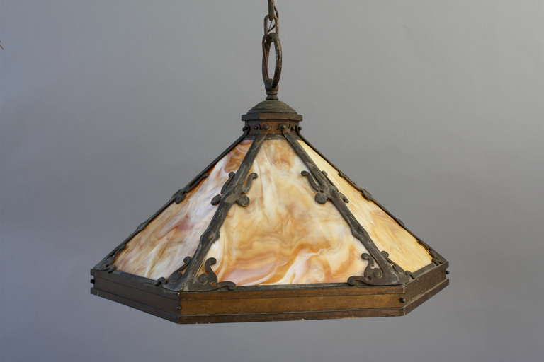 Beautiful Arts & Crafts hanging light. Measures 24 3/4