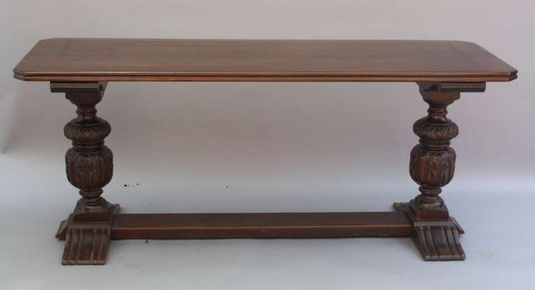 An imposing console table with beautiful carving and incised top. 29.75