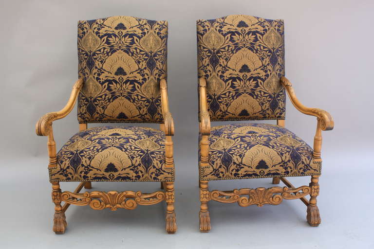 Priced for the pair. Circa 1920's carved chairs with rich new upholstery. 43.5