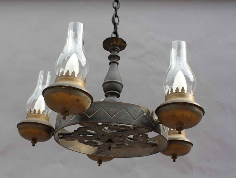 Circa 1930's chandelier with glass chimneys, incised iron . California Monterey. Fixture itself is 13.75