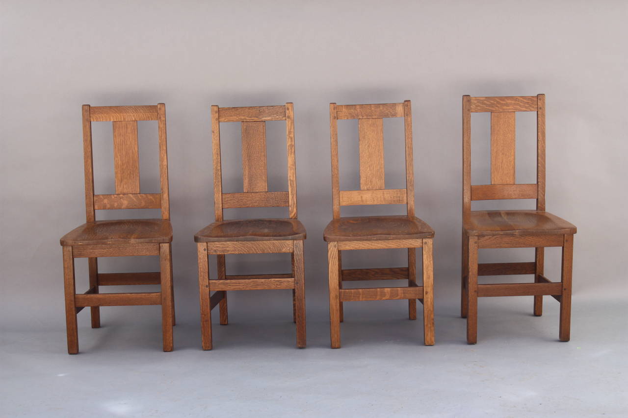 Set Of 4 Antique chairs. Circa 1910 Arts And Crafts Side chairs. Quarter sawn oak. Signed Limbert.