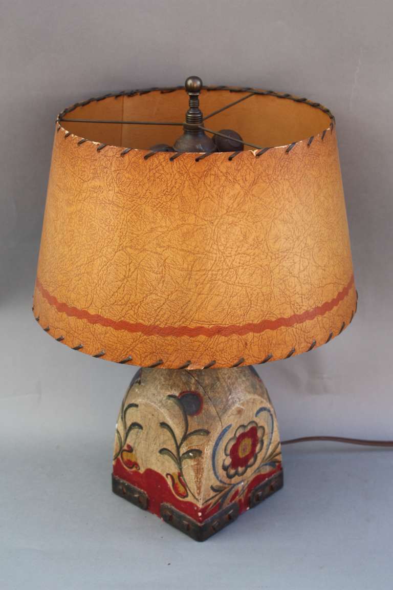Circa 1930's table lamp with paper shade. Great painted base with iron detailing