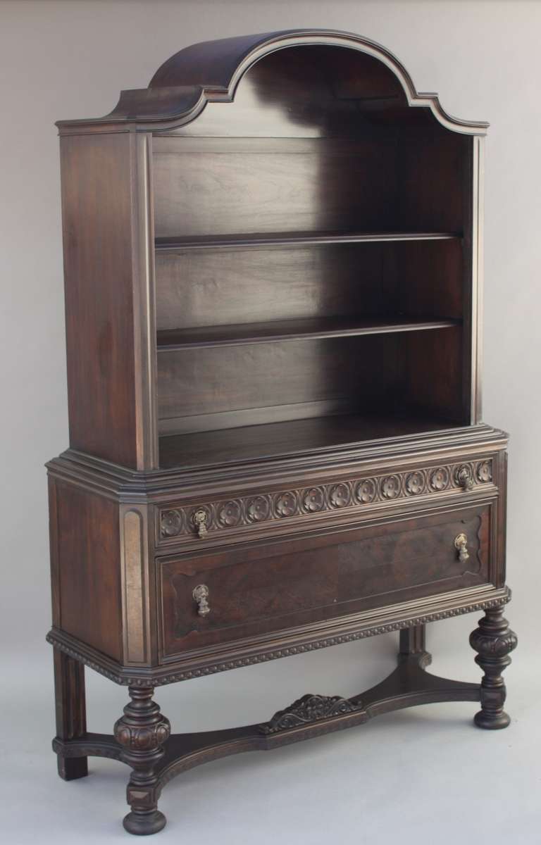 Circa 1920's walnut bookcase with one drawer. Beautiful arched top. Would look fabulous in arched cove.