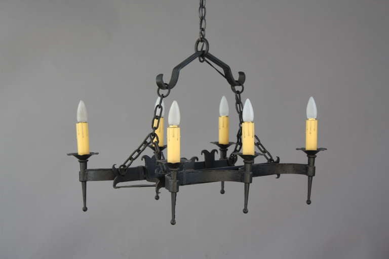 Circa 1920s wrought iron chandelier with six lights. Thebody of fixtue is 20