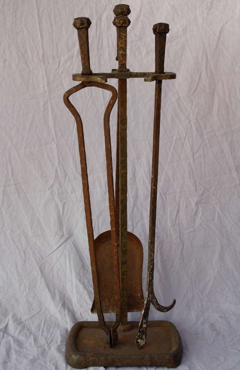 Circa 1920's fire tool set. Heavily hammered. 30