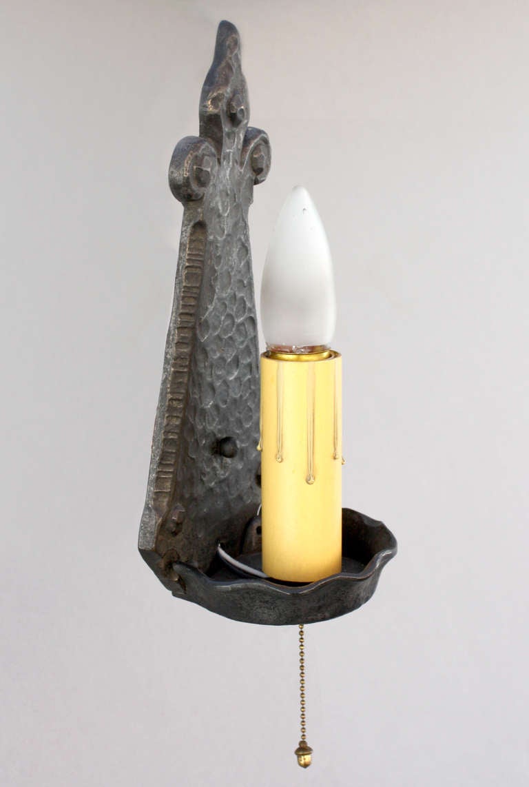 Circa 1920s. Pull chain sconce. Hammered texture. Measures 9 3/4