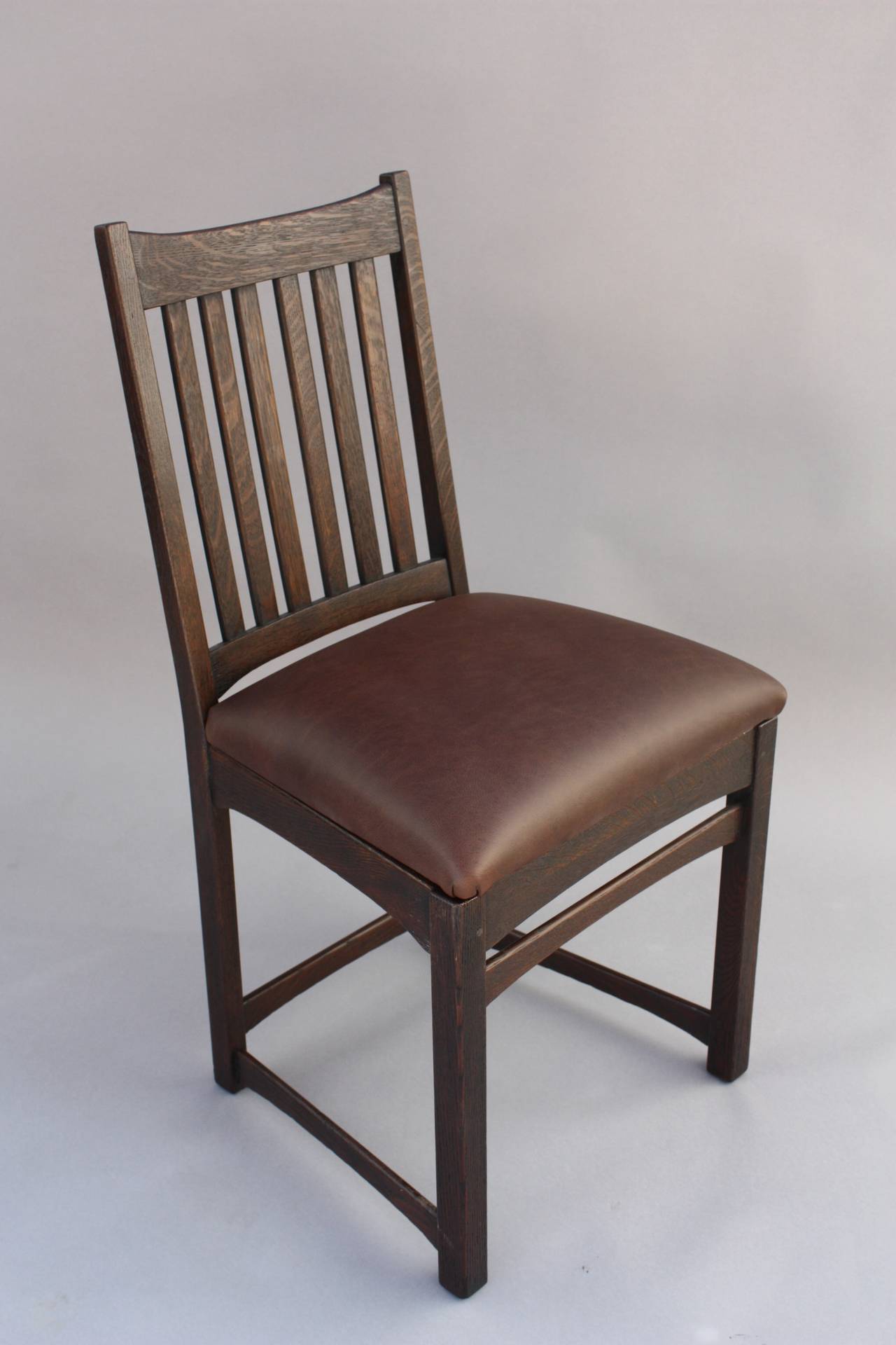Pair of signed Lifetime Arts and Crafts chairs. Newly upholstered, restored finish. Measures 20 1/4