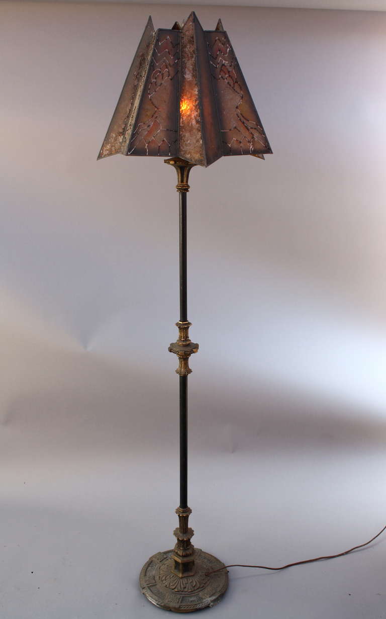 Floor lamp with original unusual, faceted mica shade circa 1920's. Measures 63