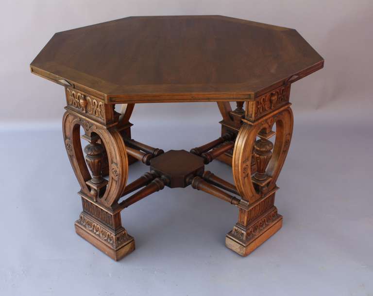 Circa 1920's carved walnut table. Beautiful carved details. Rich patina. 29.75