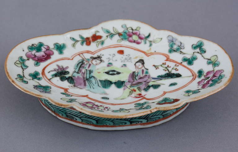 This 19th Century dish is an unusual scalloped form. It shows wear but it in excellent condition. Measures 1 1/2