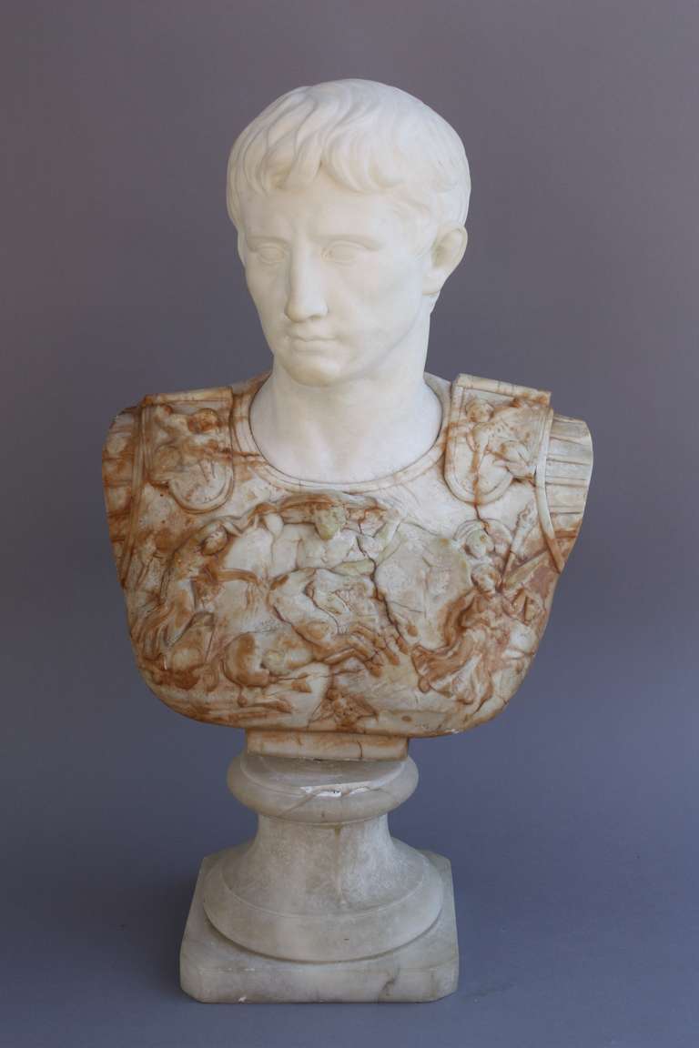 Circa 1880's bust of cesar. A finely sculpted bust with beautiful two toned marble and great detailing in armor. Measures 24 1/4