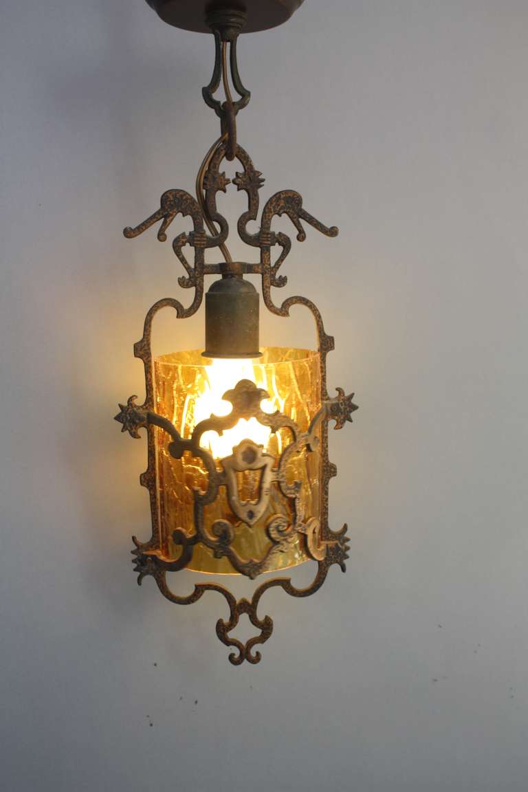 Small 1920s fixture with original amber crackle glass shade. Perfect for a hallway or other small area. Measures 17