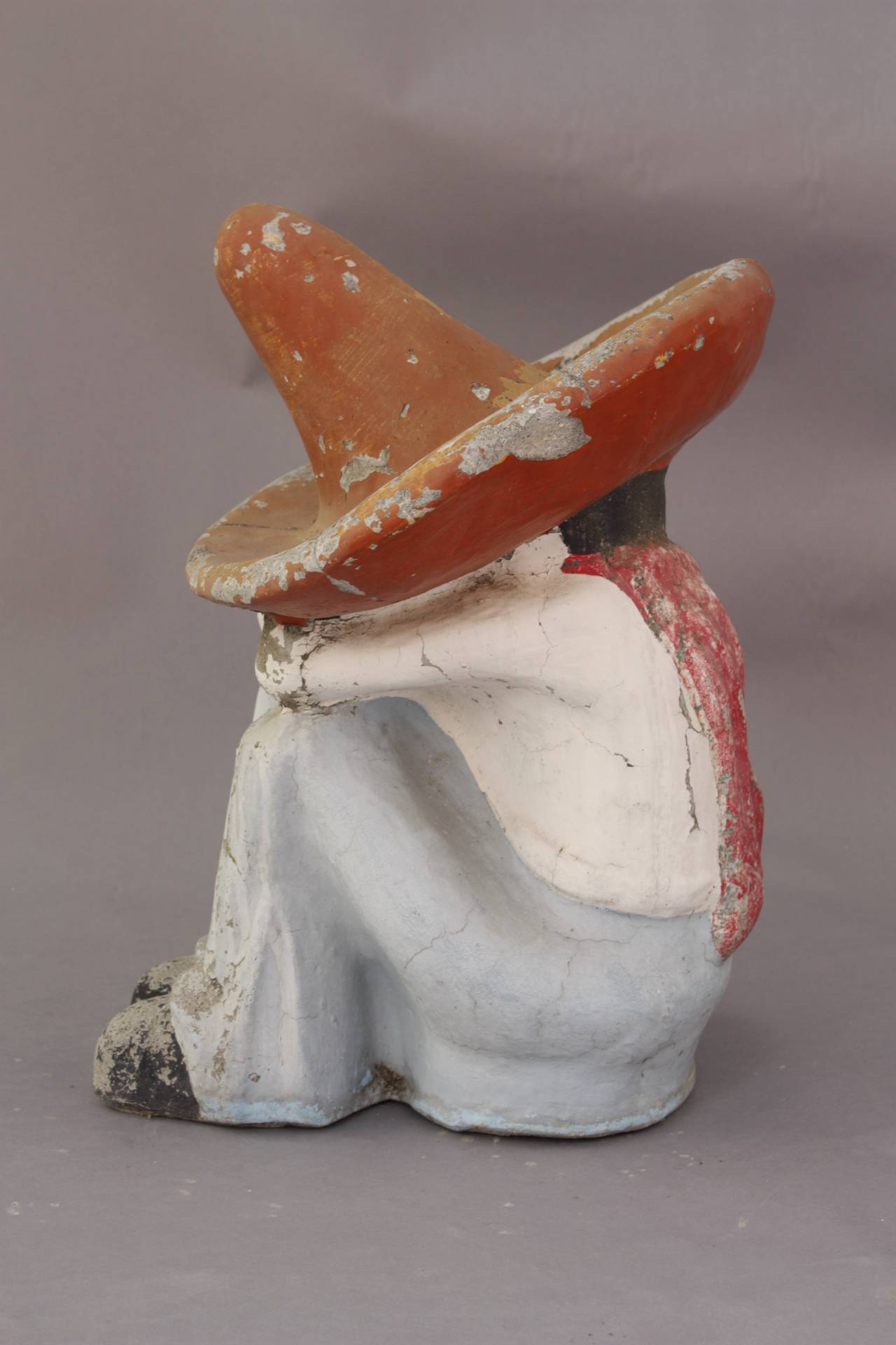 Cement sleeping Mexican. Original paint. Some paint loss but overall good condition for the age of the piece. 21