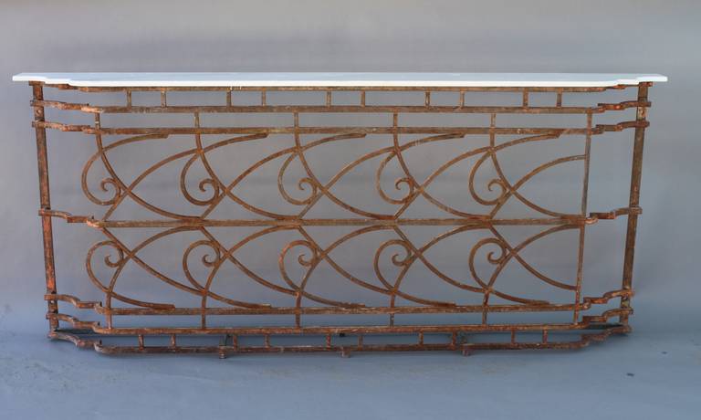 Circa 1920's iron console with new marble top. Original rusty patina on iron base. A very hard size to find! Measures 86.1/2