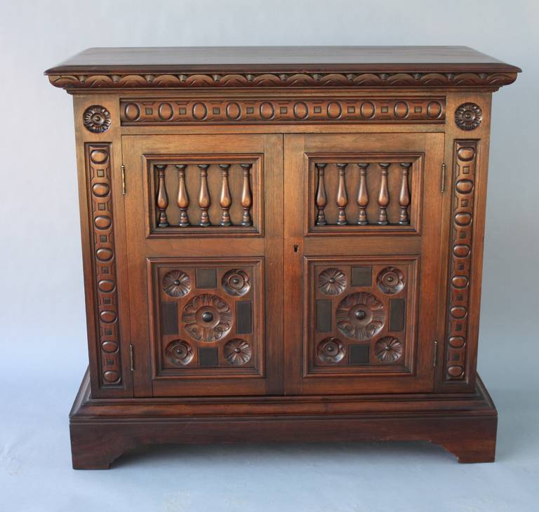 Circa 1920's . A beautiful side piece with all original finish. Carved walnut. Wonderful quality.Original polychrome finish. Measurements are 40.5