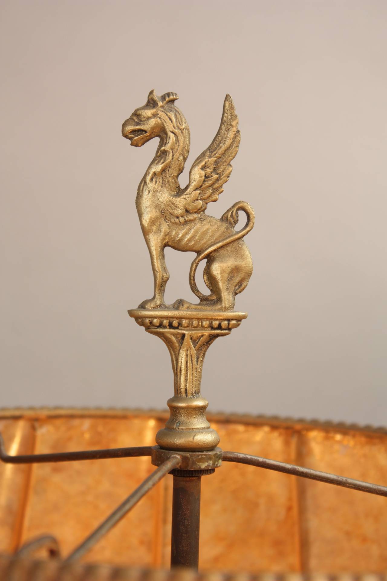 Pristine 1920s lamp with Pegasus finial. Wonderful mica shade. Attributed to the master craftsman Oscar Bach. 31