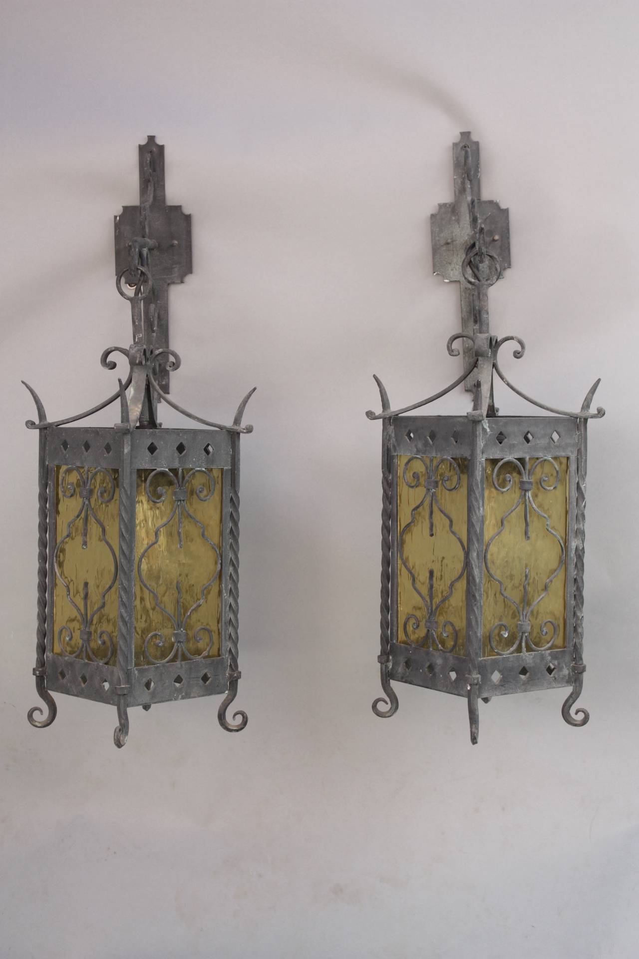 Circa 1920's wrought iron lanterns with original glass. 32.5