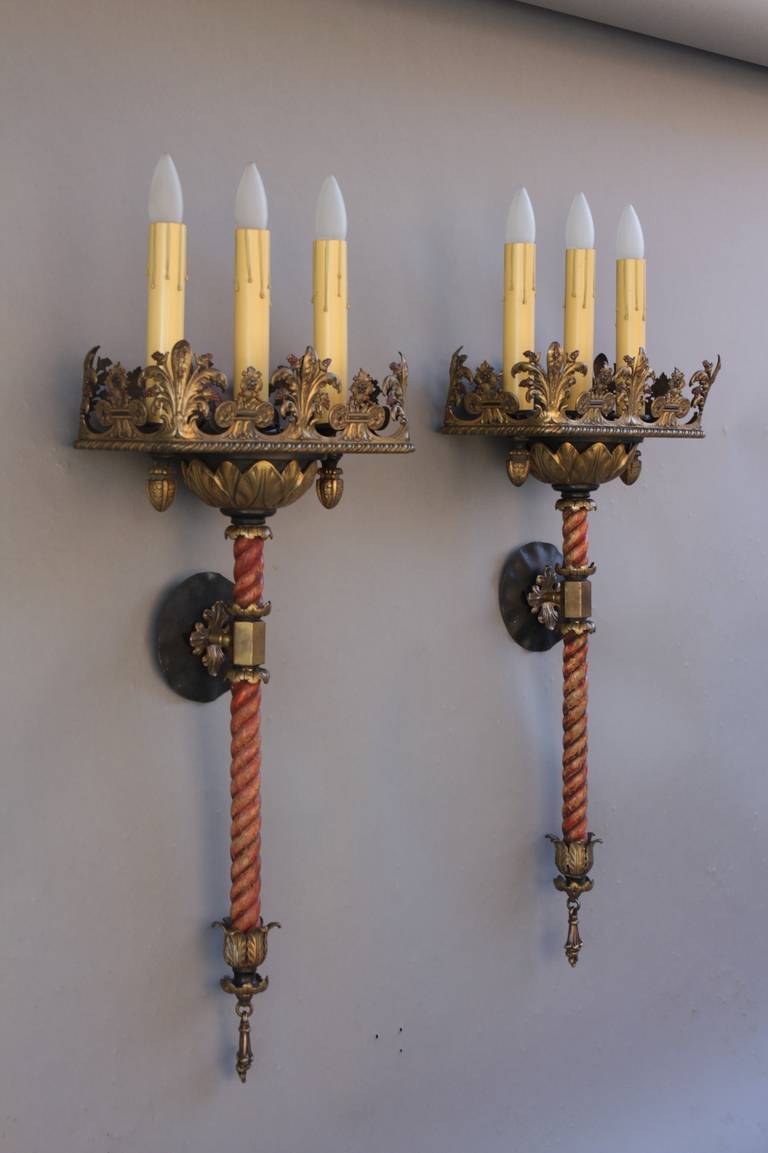 Pair of large-scale sconces salvaged from local Los Angeles home, circa 1920s. Made of brass and wood. Measures: 32.75