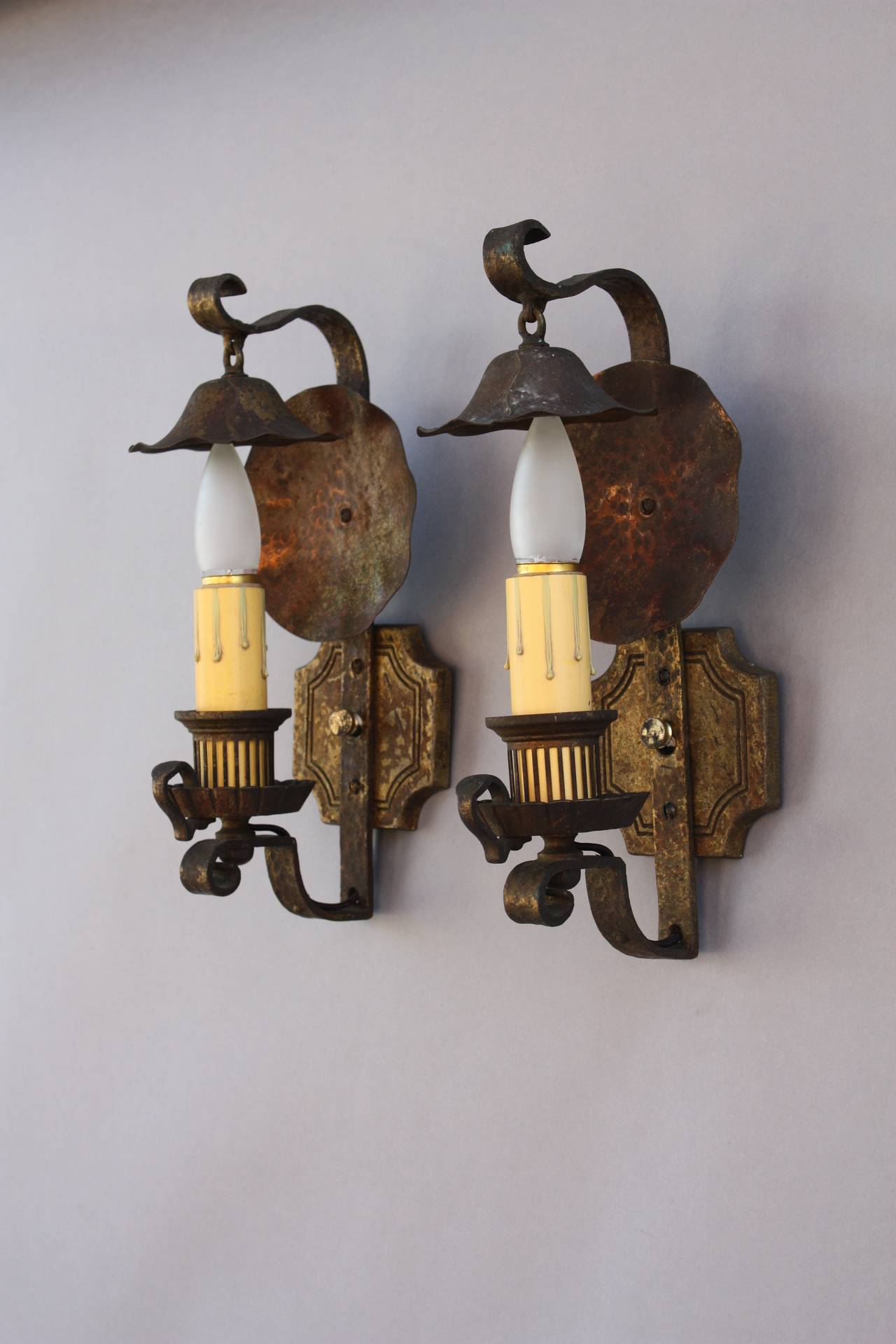 Circa 1920s pair of single light sconces. Good Original Condition.