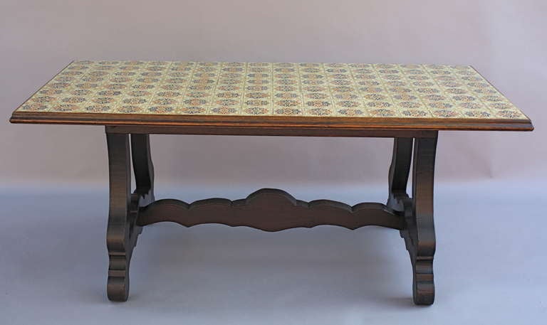 Circa 1940's walnut table with original tile top.
