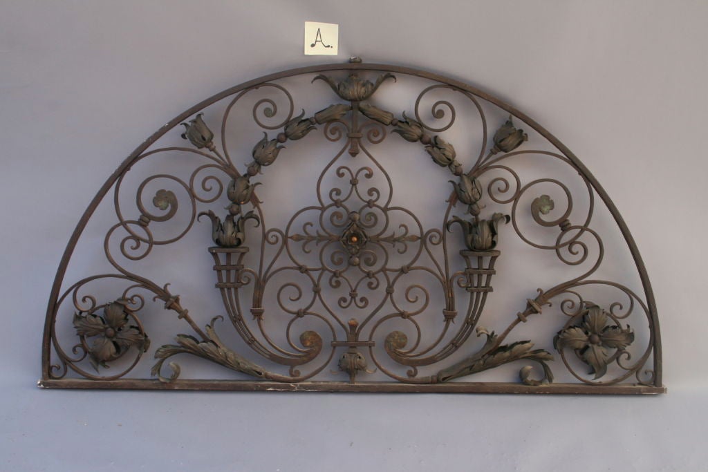 Stunning hand-wrought iron arch panel with exceptional ironwork.  Three available - sold separately.