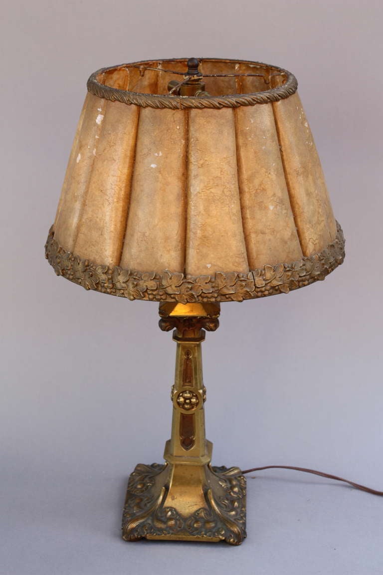 Circa 1920's lamp with finely casted base and wonderful mica shade.