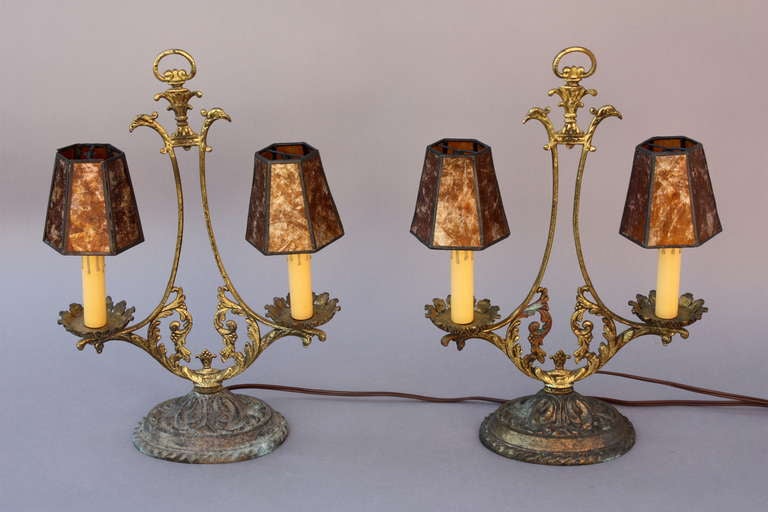 Circa 1920's lamp. Brass base and new mica shades.