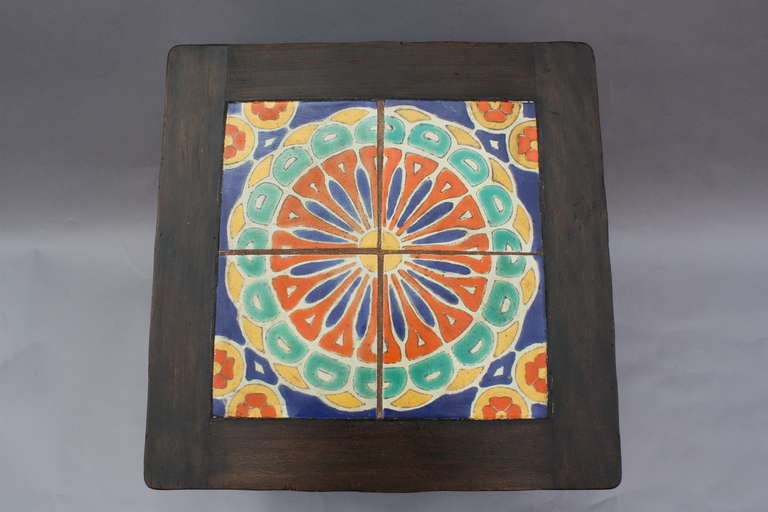 Circa 1930's tile table by the Barker Bros Cie manufactured by the Mason Cie. Branded with horse shoe mark on side. Dark finish. D&M California tiles.