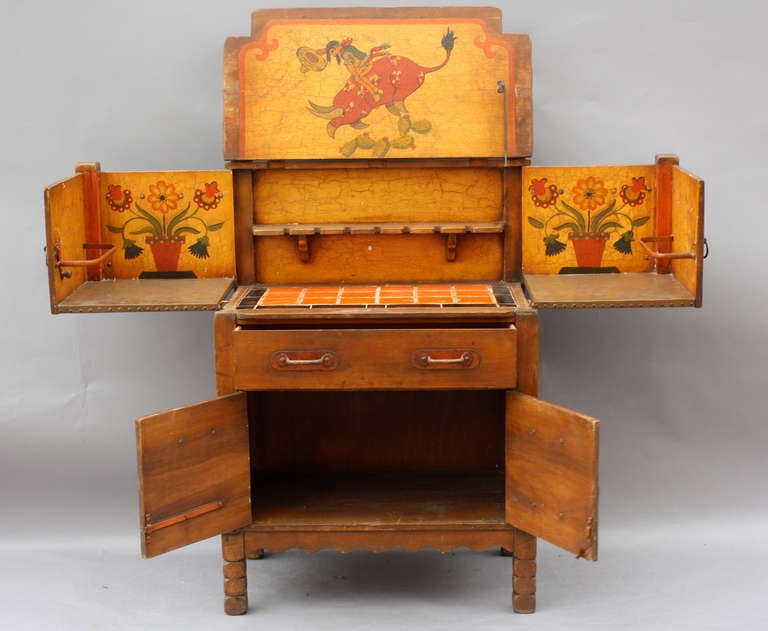 Hard to find Monterey bar by the Barker Brothers Cie. Manufactured by the Mason Manufacturing Co. Circa 1930's. Original finish, signed Monterey with colorful paintings by Juan Duran Tinoco. Orange catalina tiles and brass lined shelves. In its