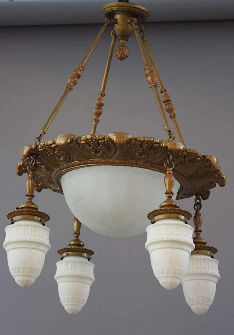 Lovely chandelier with original glass globes. American.