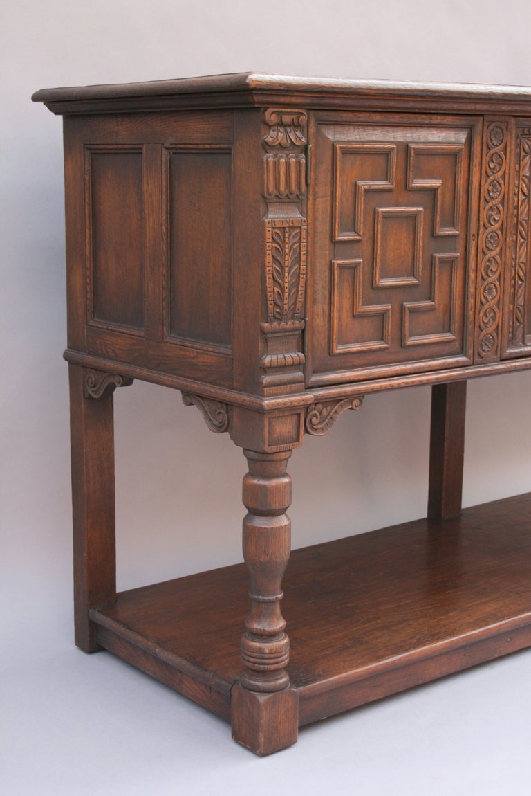 Handsomely carved sideboard c. '20's. Marshall Laird made furniture in Los Angeles in the 1920's for the most prestigious houses of the golden era. The company was often featured in Architecture Digest.