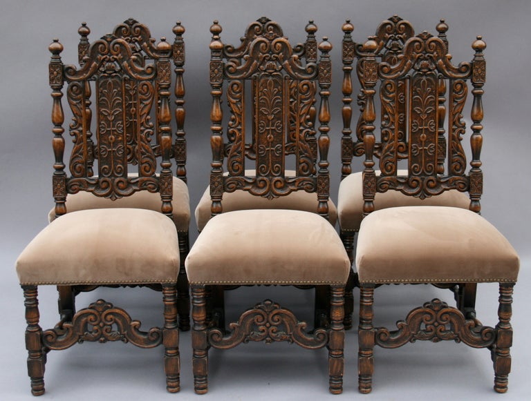 Exquisite set of dining chairs c. 1920's by Marshall Laird of Los Angeles, known for his custom furniture of the highest quality; chairs have been recently reupholstered in Belgian velvet; armchairs measure 18